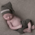 Newborn fotoshoot geposeerd 29 voorbereiding newbornfotoshoot. Baby liggend op een kleedje slapend
